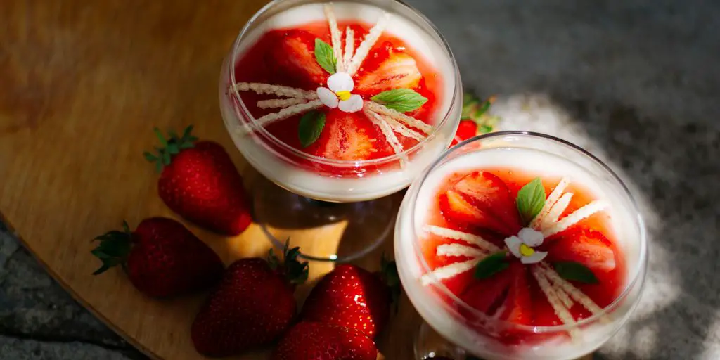 clear drinking glass with strawberry juice